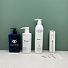 No-drill toiletry packaging set with visible liquid level